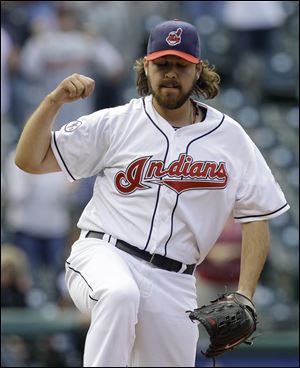 Cleveland Indians relief pitcher Chris Perez reacts after the Indians beat the Chicago White Sox 4-3 in the first baseball game of a doubleheader, Tuesday.