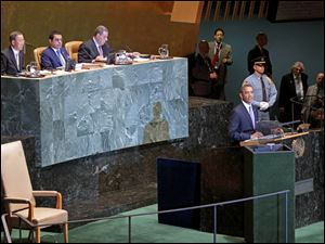 President Barack Obama, lower right, addresses the U.N. General Assembly at the United Nations Building.