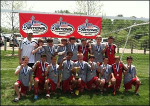 The Pacesetters U13 squad shows off their championship medals. Front, from left, Jonah Masters, Saleh Elhady, Alec Marshall, Aerin West, Ian Baird, Travis Russell, Matt Wainstein, Austin Dilday, and Tyler Biggs. Back, coach Ryan Creech, Quentin Stout, Stephen Wainz, Keegan Winkler, Jason Wheeler, Branden Chuhy, and Will McIntyre.