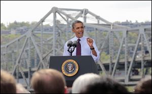 President Barack Obama delivers remarks at the Brent Spence Bridge, regarding his American Jobs Act Now legislation in Cincinnati.