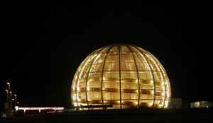 The globe of the European Organization for Nuclear Research, CERN, is illuminated outside Geneva, Switzerland.