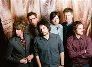 Wilco members, from left, Pat Sansone, Mikael Jorgensen, Jeff Tweedy, Glenn Kotche, Nels Cline and John Stirratt are shown.