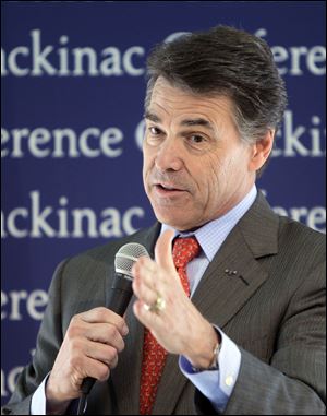 Texas Gov. Rick Perry won some supporters at the Michigan conference but his second-place finish was the second consecutively over the weekend.