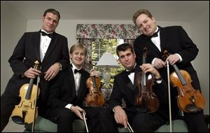 A  Dec. 20, 2001--From left, Alex, Zach, Wallace and Jason DePue at their parent's Bowling Green home.