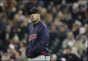 Cleveland Indians manager Manny Acta walks to the mound during Tuesday's game against the Tigers.