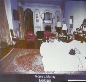 Deputy District. Attorney. David Walgren  displys an image of Micheal Jackson's Holmby Hills bedroom while questioning Alberto Alvarez,one of Michael Jackson's security guards, during Conrad Murray's involuntary manslaughter trial in downtown Los Angeles, Thursday.  Murray has pleaded not guilty and faces four years in prison and the loss of his medical license if convicted of involuntary manslaughter in Michael Jackson's death.