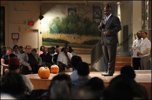 Mayor Mike Bell speaks during a meeting of the minds for the 