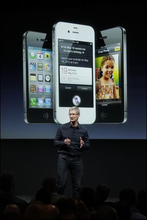Tim Cook, Apple's new chief executive, takes Steve Jobs' role in introducing the product.