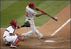 Phillies pinch-hitter Ben Francisco blasted a three-run home run off Cardinals pitcher Jaime Garcia.
