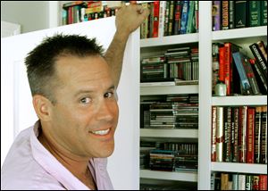 Best-selling author Vince Flynn is shown in the library of his Edina, Minn., home Sept. 2, 2005.