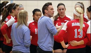 Eastwood coach Jeff Beck talks to his team in a match against Lake. Beck led the Eagles to SLL titles in 2009 and 2010.