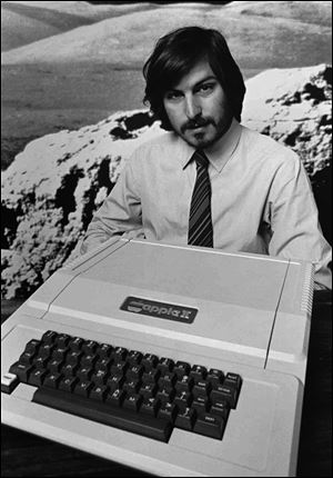 Apple co-founder Steve Jobs as he introduces the new Apple II in 1977 in Cupertino, Calif. 