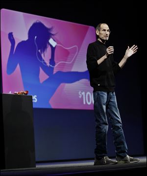 Apple CEO Steve Jobs delivers a keynote address at the Apple Worldwide Developers Conference in June, 2011, in San Francisco. 