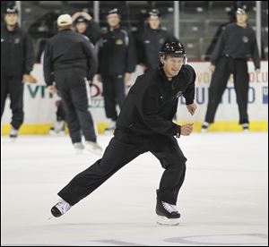 Curtis Marouelli, 26, of Edmonton, skates during a drill at the ECHL referee camp last month at the Huntington Center.