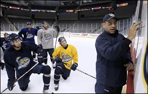 Walleye coach Nick Vitucci gives instructions to his team during a practice at Huntington Center. Toledo, which missed the playoffs last season, has 13 new players on its 22-man roster