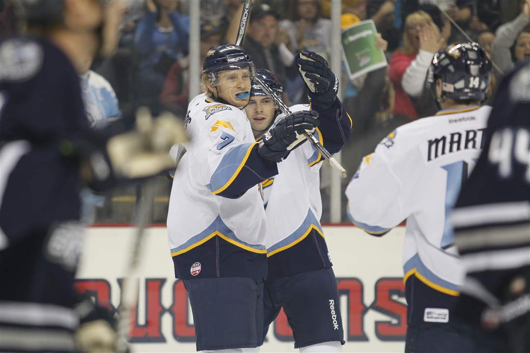 Walleye-player-Kyle-Rogers-17-and-Bryan-Rufenach-21-celebrate-Rogers-goal