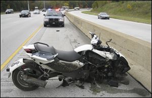 The motorcycle Cleveland Browns defensive end Marcus Benard crashed Monday, Oct. 10, 2011 in Brooklyn, Ohio.