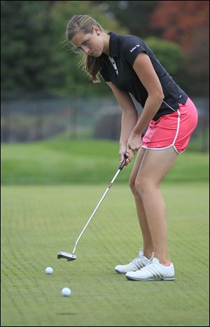 Heather Gonring works on her putting at Bedford Hills Golf Club. She has on offer at the University of Findlay.