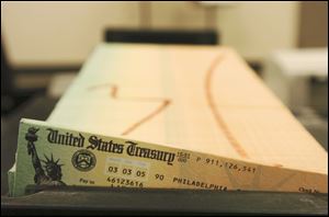 Trays of printed social security checks wait to be mailed from the U.S. Treasury's Financial Management services facility in Philadelphia.