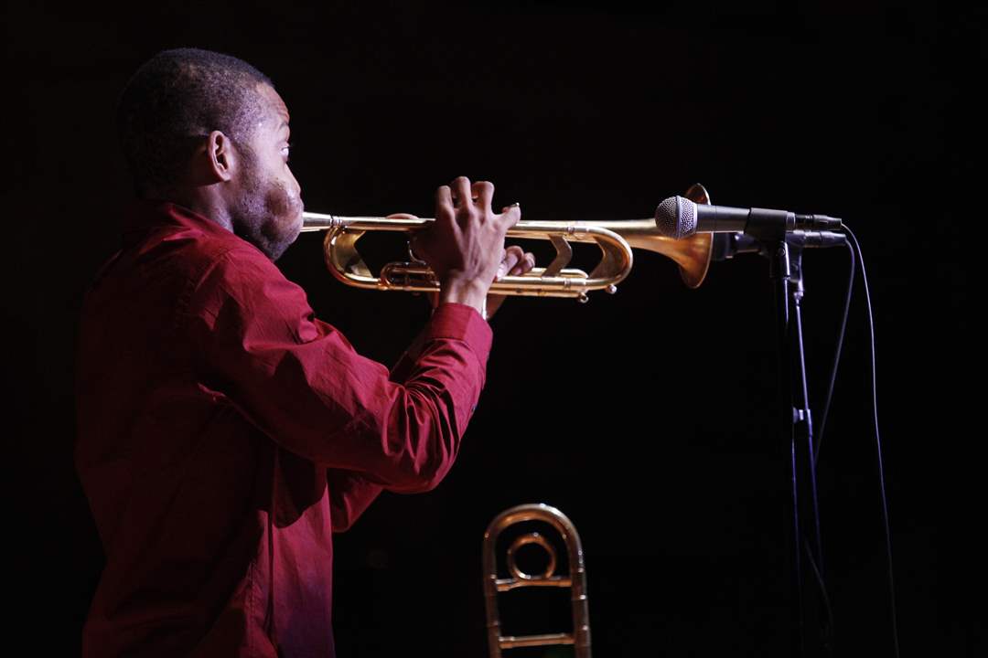 Andrews-plays-a-long-note-on-the-trumpet