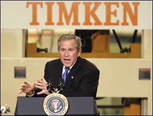 President Bush announces his economic agenda at the Timken Co. in Canton, Ohio, during his re-election campaign. 
