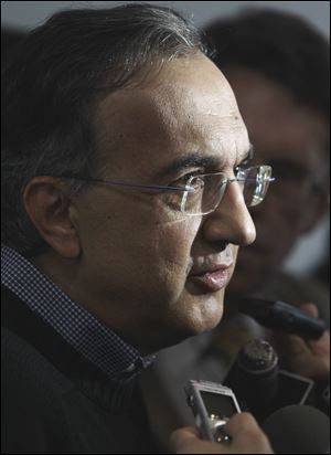 Chrysler CEO Sergio Marchionne says two-tier wage system creates a divide between blue collar workers.