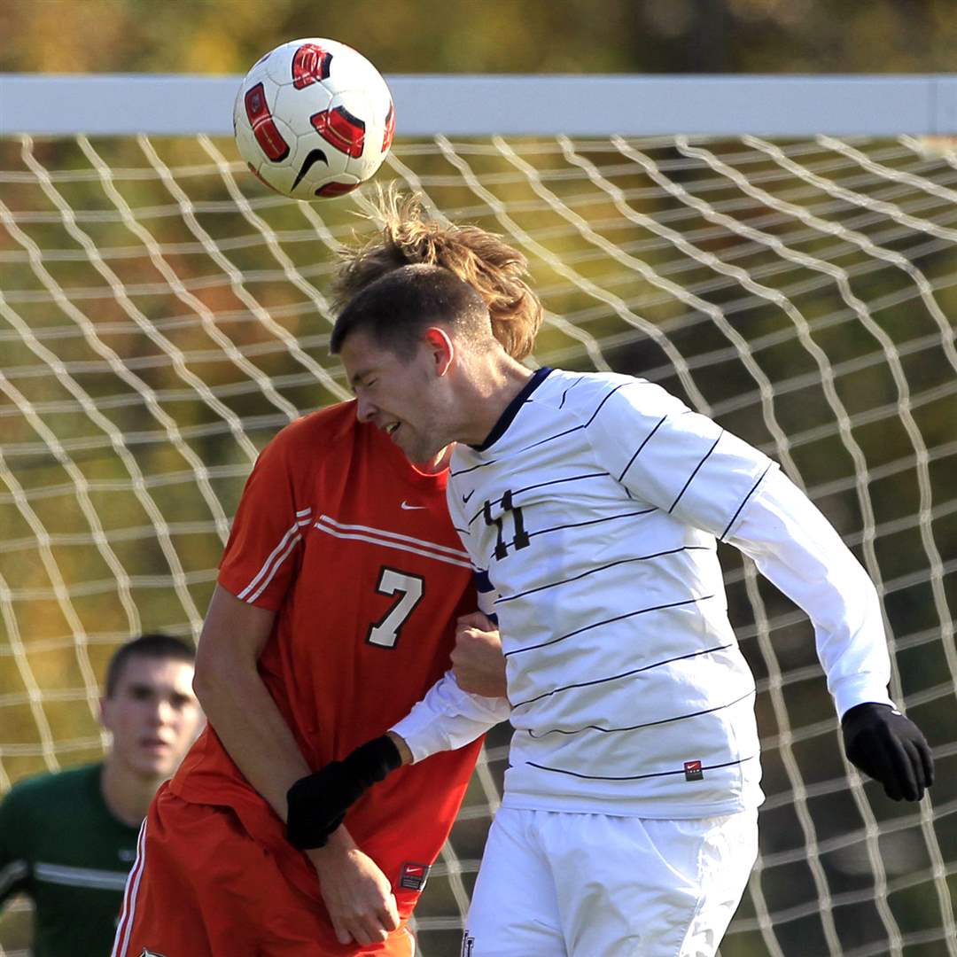 St-John-s-Evan-Lee-and-Southview-s-Brad-Brown-7-battle-for-a-header