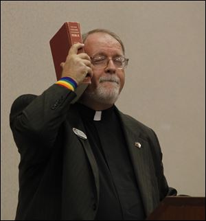 The Rev. Stephen Sprinkle, a gay Baptist minister from Dallas, says that the Bible and church teachings don't necessarily condemn homosexuality; the Ten Commandments don't even mention it. 