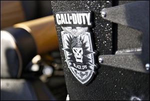 The Jeep Wrangler Unlimited comes with the 'Call of Duty: Black Ops' insignia on the vehicle.