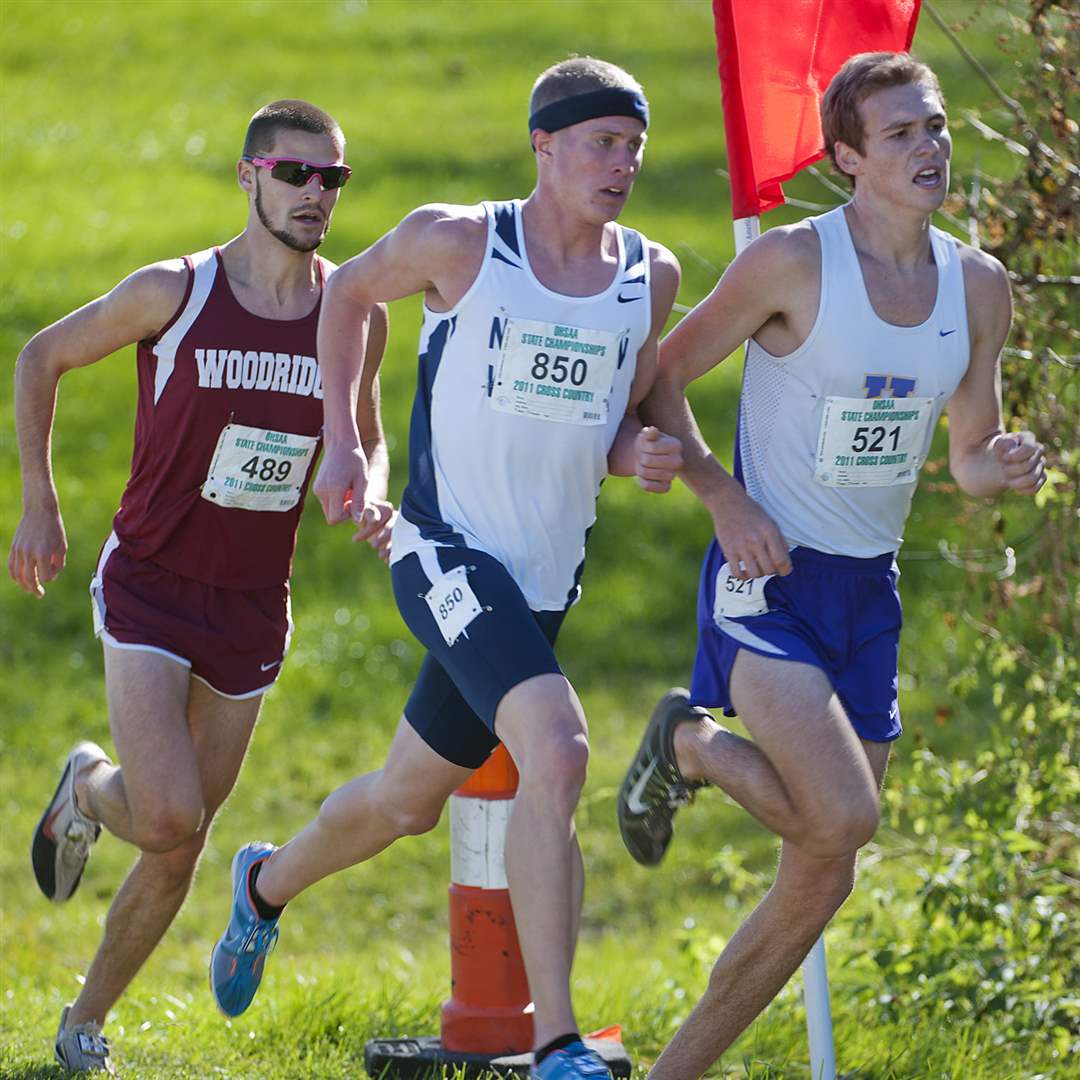 Napoleon-s-Steve-Weaver-middle-fights-for-position-in-the-Boy-s-DII-State-Cross-Country-Meet