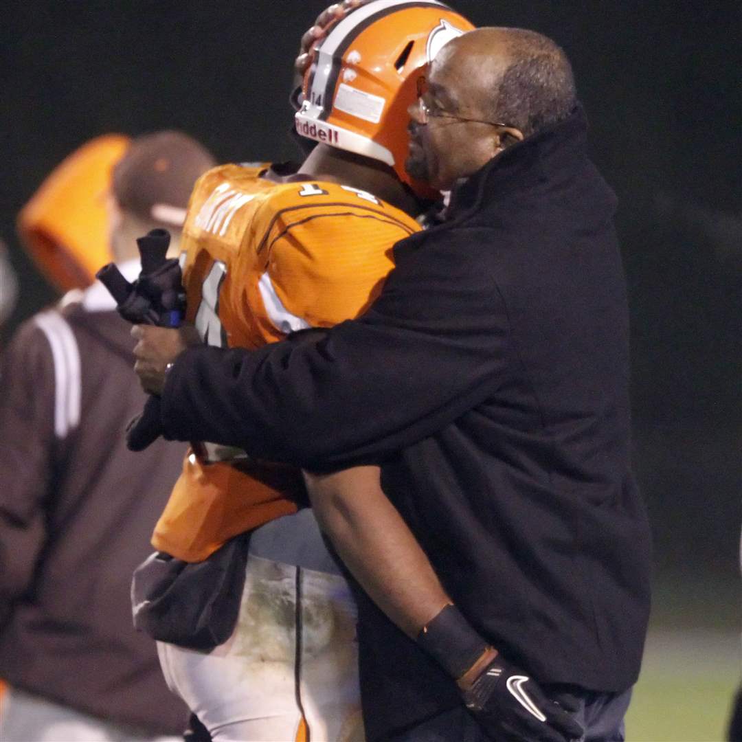 Southview-s-Gant-is-comforted-by-his-father-after-their-loss