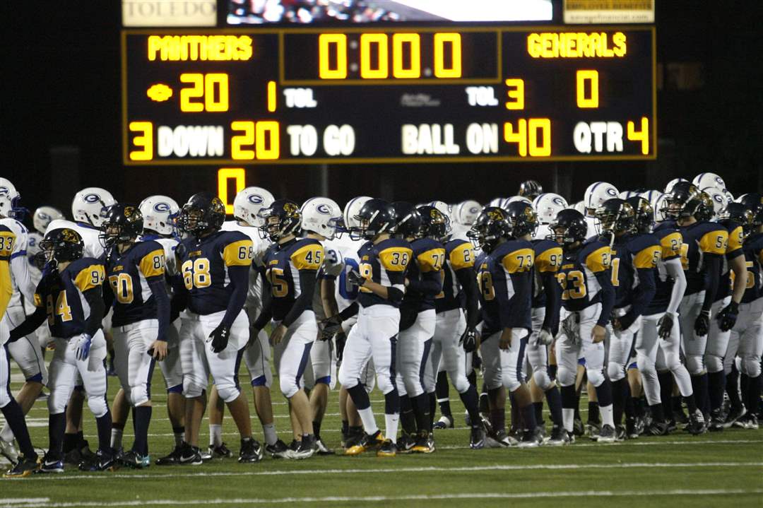 Whitmer-players-and-Anthony-Wayne-shake-hands-after-the-Panthers-beat-the-Generals
