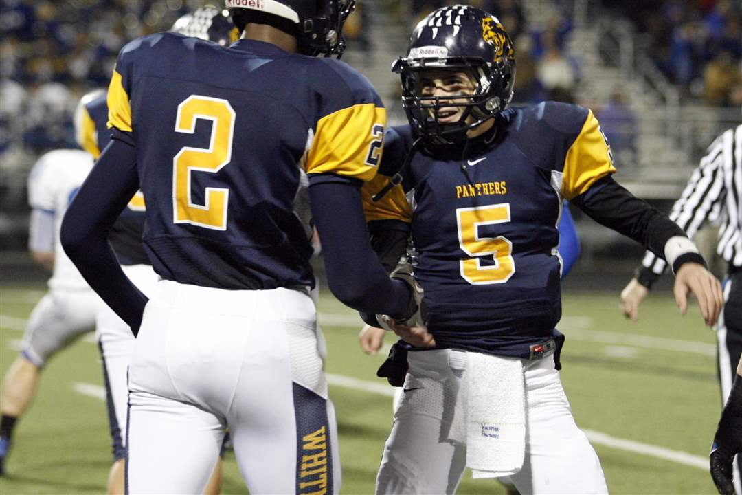 Whitmer-receiver-Hayes-2-and-QB-Palka-celebrate-a-touchdown-connection