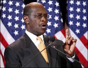 Republican presidential candidate Herman Cain addresses the media Tuesday, in Scottsdale, Ariz.  Cain said Tuesday that he would not drop his bid for the Republicans presidential nomination in the face of decade-old allegations of inappropriate sexual behavior.