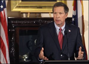 Ohio Gov. John Kasich speaks about Issue 2 and election results at a news conference in Columbus. Ohio voters on Tuesday rejected a new law restricting the collective bargaining abilities of public employee unions in an unusually vigorous off-year election that drew attention across the nation.