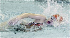 Stingray swimmer Emma Mulder does the front crawl during practice for the the Stingrays swim team at the Francis Family YMCA in Lambertville.