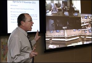 David Teall teaches an advanced placement class at Start High School that is transmitted to other schools in the Toledo Public Schools system. The distance-learning labs are in their first semester.