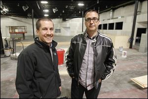 CedarCreek Church Campus Pastor Ben Snyder, left, and Senior Pastor Lee Powell, right, stand in the auditorium of their new church under construction in the former Farmer Jack grocery store on Byrne Road in South Toledo.