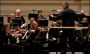 Members of the Toledo Symphony under the direction of Principal Conductor Stefan Sanderling perform in the Spring for Music festival Saturday, May 7, 2011, at Carnegie Hall in New York.