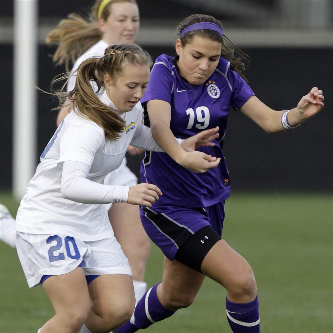 St-Ursula-s-Kelly-Farell-and-DeSales-Maria-Riley-chase-a-loose-ball