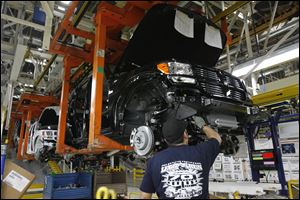 A Dodge Nitro moves along the production line at Chrysler's Toledo North Assembly plant.