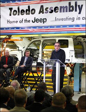 Chrysler's Sergio Marchionne, right, details plans for the Toledo complex. With him Wednesday were Ken Lortz, UAW Region 2B director, left, and Gov. John Kasich.