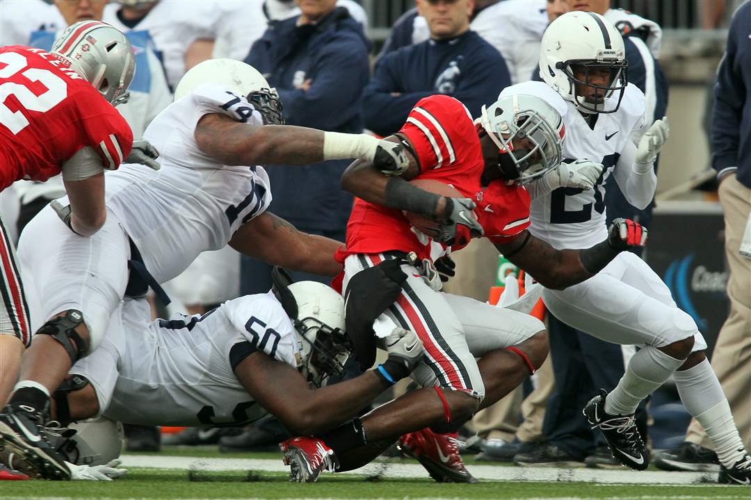 OSU-safety-Orhian-Johnson-is-broughd-down-by-Penn-State-after-an-interception