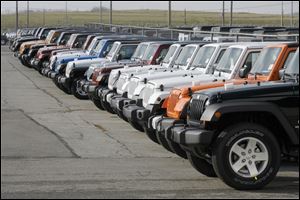 Jeep Wranglers are lined up at Chrysler's Toledo North Assembly plant.