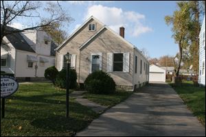 Three companies — Phoenix Custom Builders, CSK Construction, and Toledo Urban Revitalization — were invited to bid on rehab work for this house at 829 Brookley Blvd., near the University of Toledo.