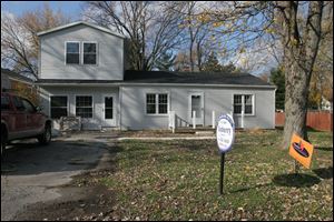 This house at 1737 Copley Dr. was one of three structures for which rehabilitation bids were sought by Friendship New Vision, a community development agency affiliated with Friendship Baptist Church.