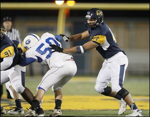 Whitmer's Chris Wormley pushes Anthony Wayne's Grant Judson in a playoff game. Wormley has 85 tackles and 13 QB sacks this season.