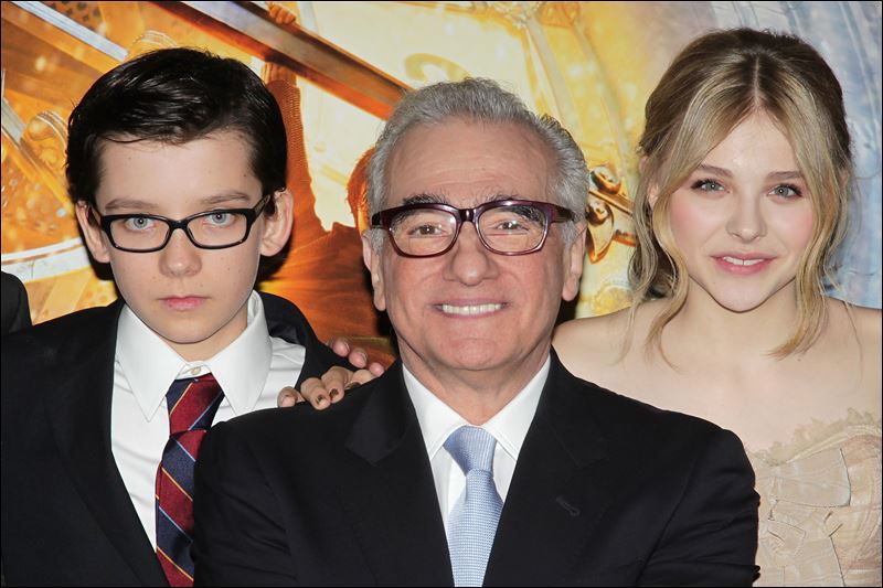 From left, Asa Butterfield, Martin Scorsese and Chloe Moretz pose at