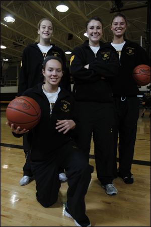 Defending champion Northview will be lead by, from left, seniors Miriam Justinger, Chelsey Mason, Skylar Rose, and Jessica Jessing.