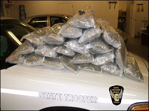Ohio State Highway Patrol troopers seized 21 pounds of hydroponic marijuana from a vehicle traveling on the Ohio Turnpike. 